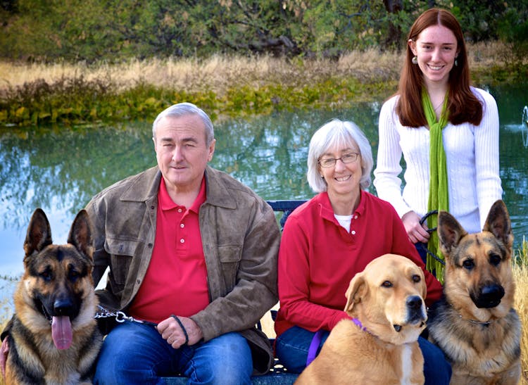 Casas Adobes owners pose with their family and pets